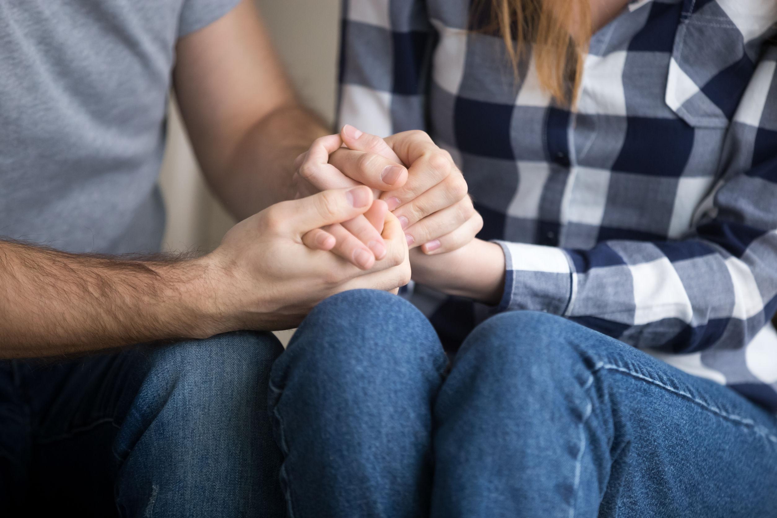 Married couple offering support to each other during a dead body cleanup in Fort Worth