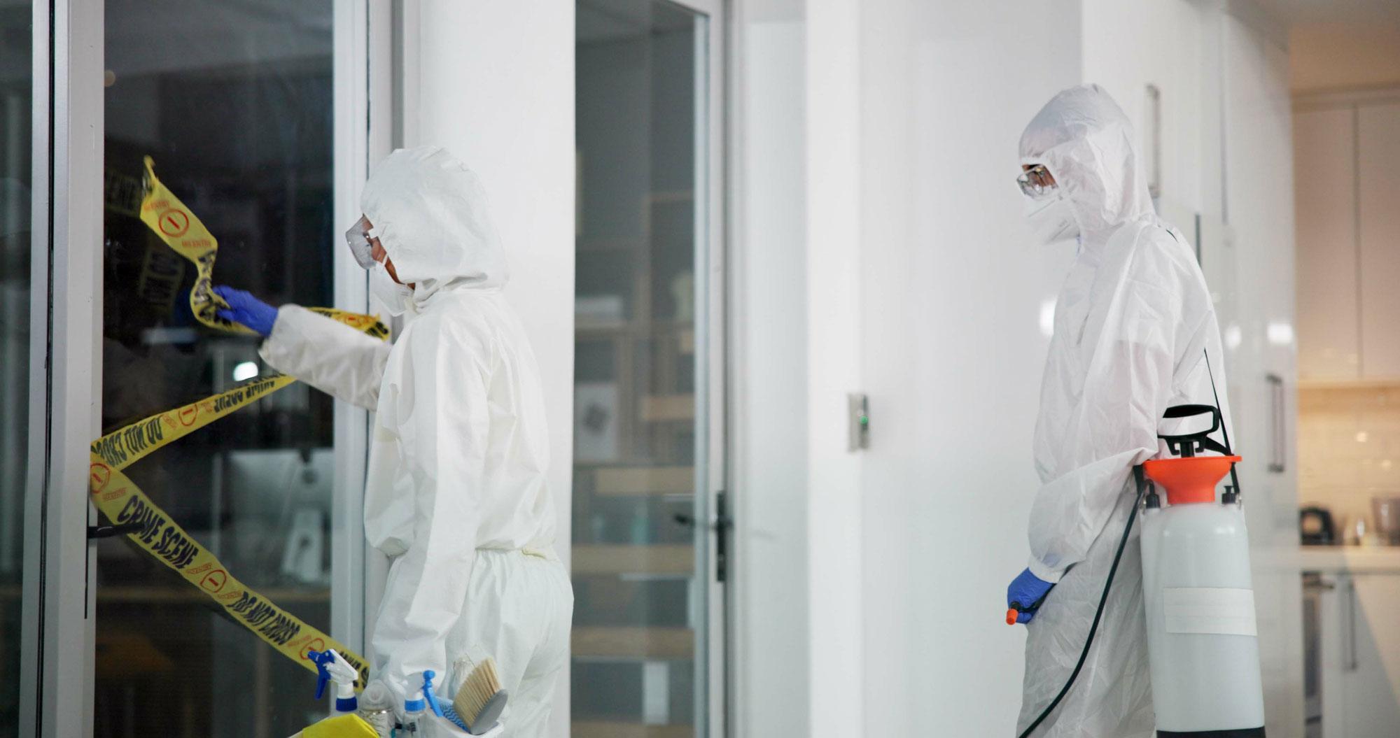 Crime scene cleanup crew removing biohazard waste in McKinney